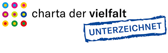 Bunte Punkte und die Aufschrift "charta der vielfalt unterzeichnet"